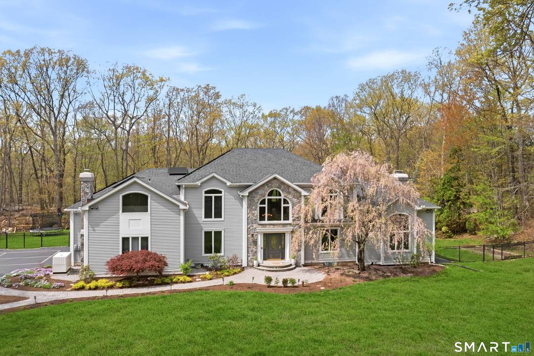 Nestled in the heart of Connecticut's highly acclaimed Trumbull school district, in the sought after Tashua neighborhood resting on 5 acres is pure elegance.