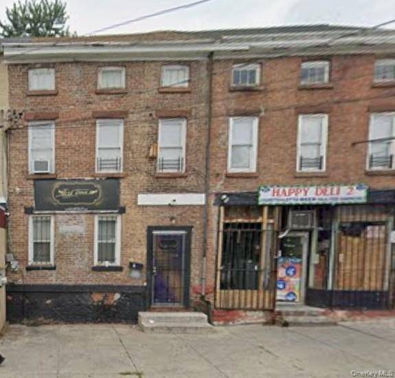 5 Unit, Mixed Use Building located on Liberty Street, across from a historic landmark.