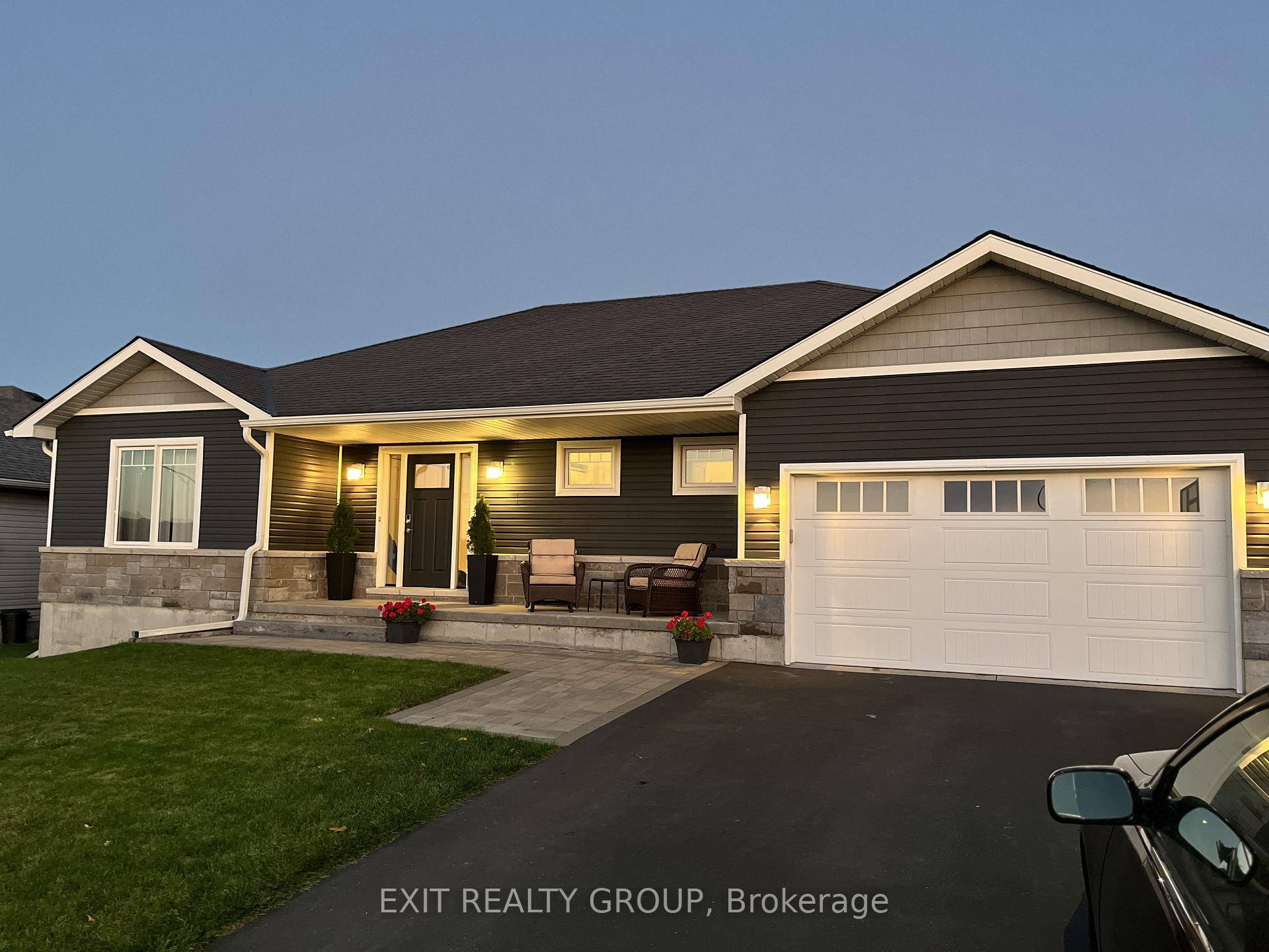 Step into a world of elegance with this remarkable bungalow, thoughtfully designed in 2016 to showcase the breathtaking vistas of the Trent River.