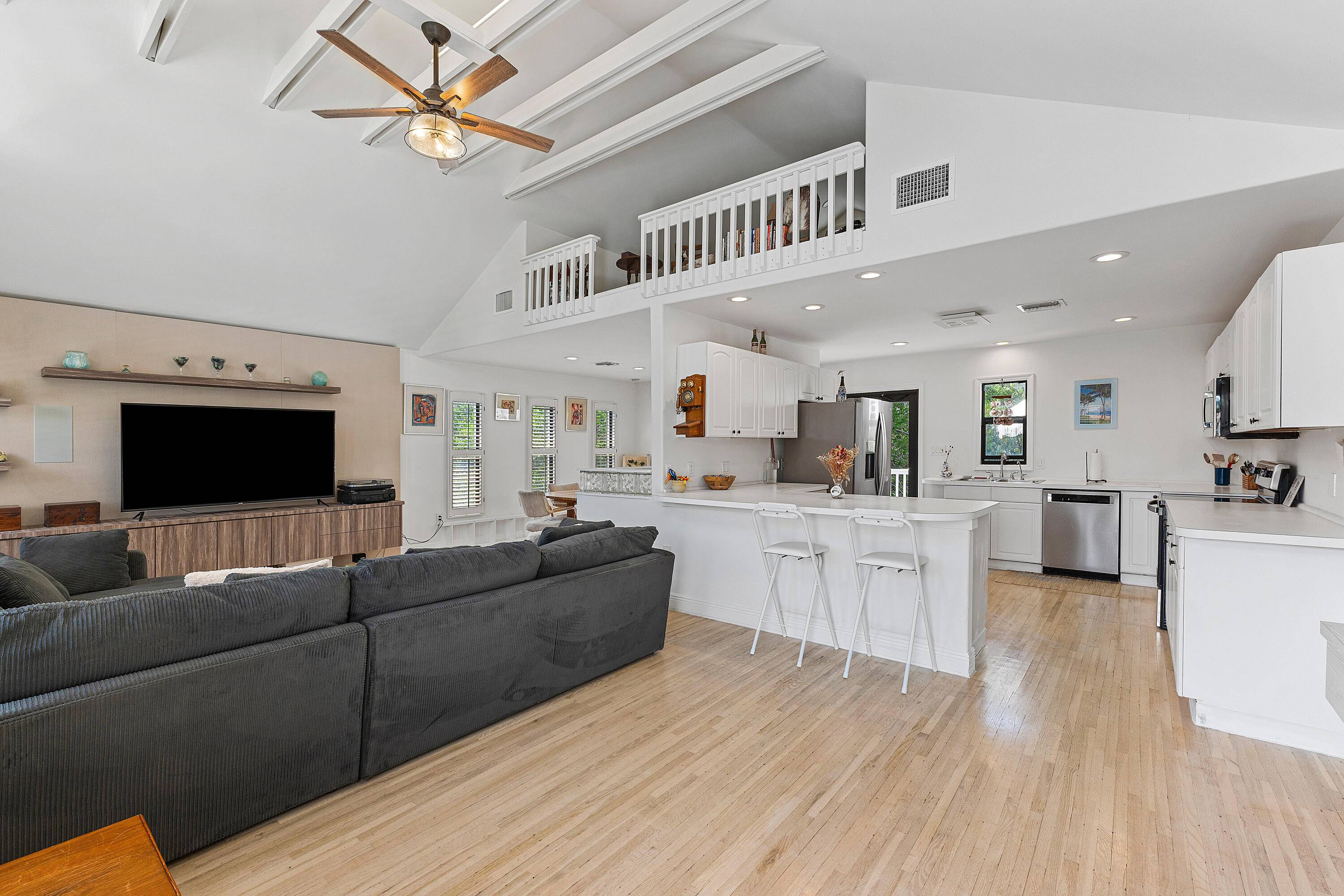 Truly one of a kind, this two story home sits on a tranquil, tree lined street that ends at the Intracoastal in East Boynton Beach.