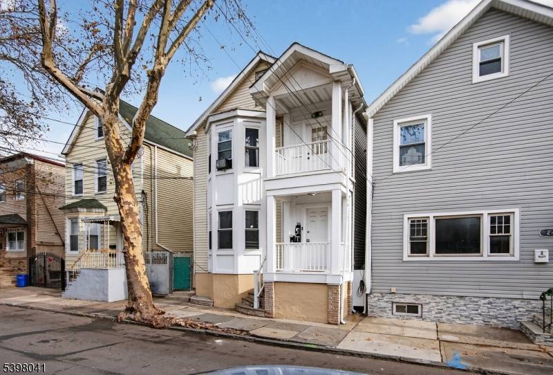 Beautifully updated multi family property featuring modern kitchens, renovated baths, and excellent rental appeal.