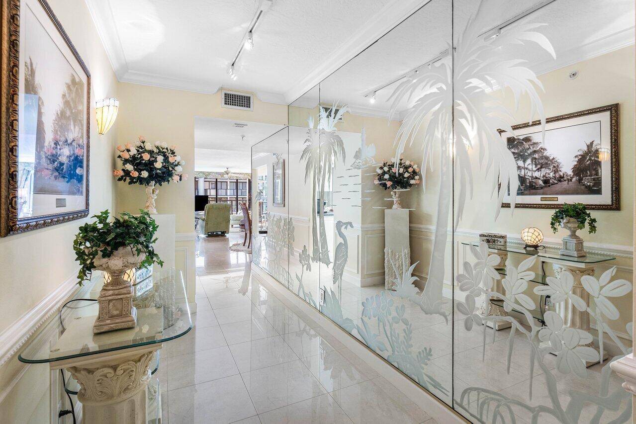 This elegant residence says ''Palm Beach'' the moment you enter.