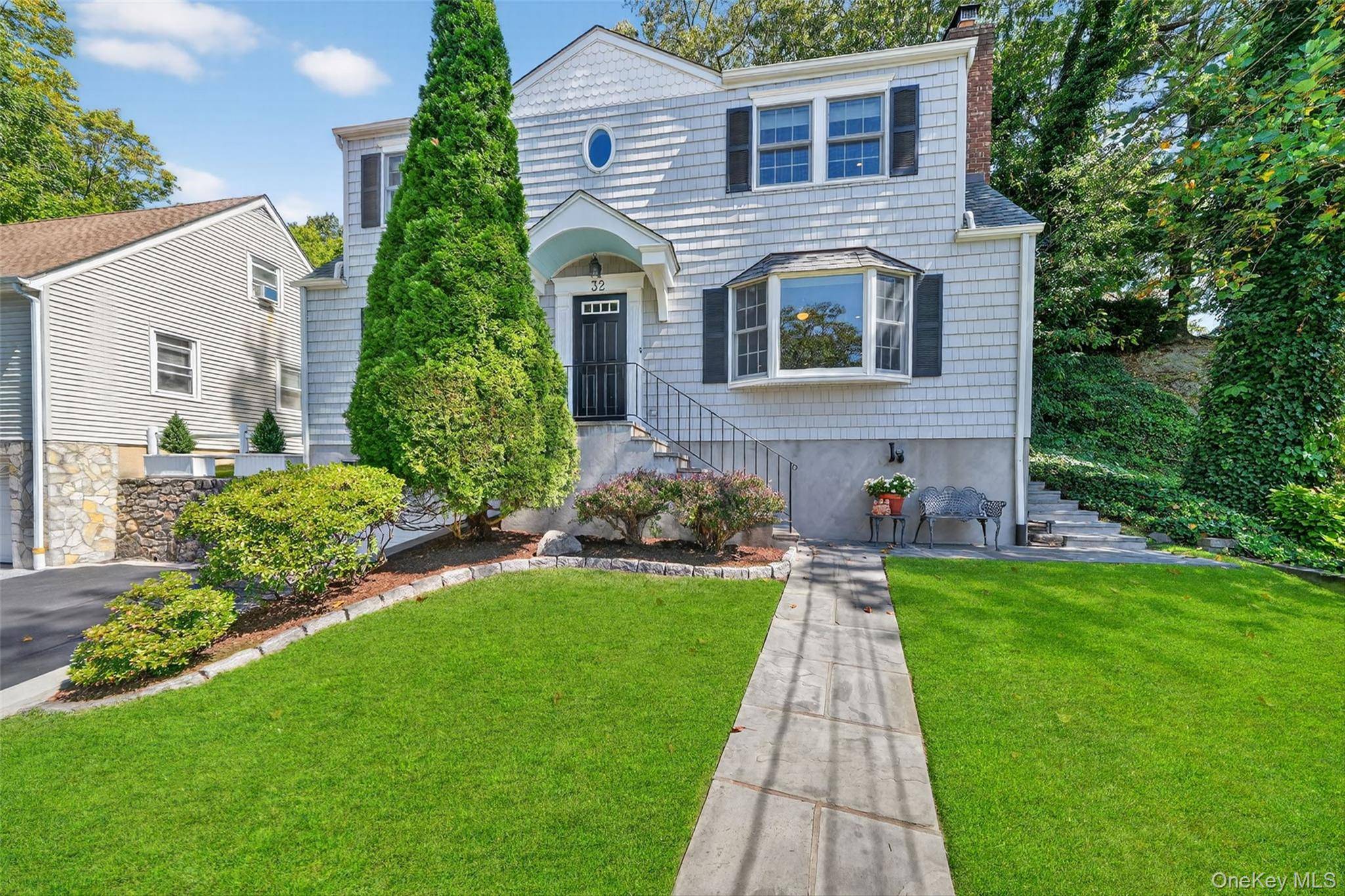 An absolute dream home awaits you, nestled in the Hamlet of North White Plains with Valhalla Schools.