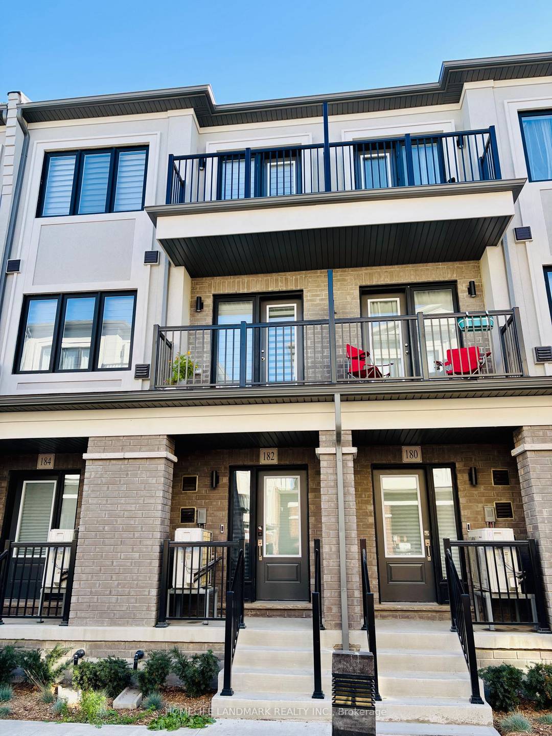 Welcome to this luxury town home by Treasure Hill, Bright open concept, modern kitchen with quartz countertops, stainless steel appliances, and an upgraded electric fireplace.