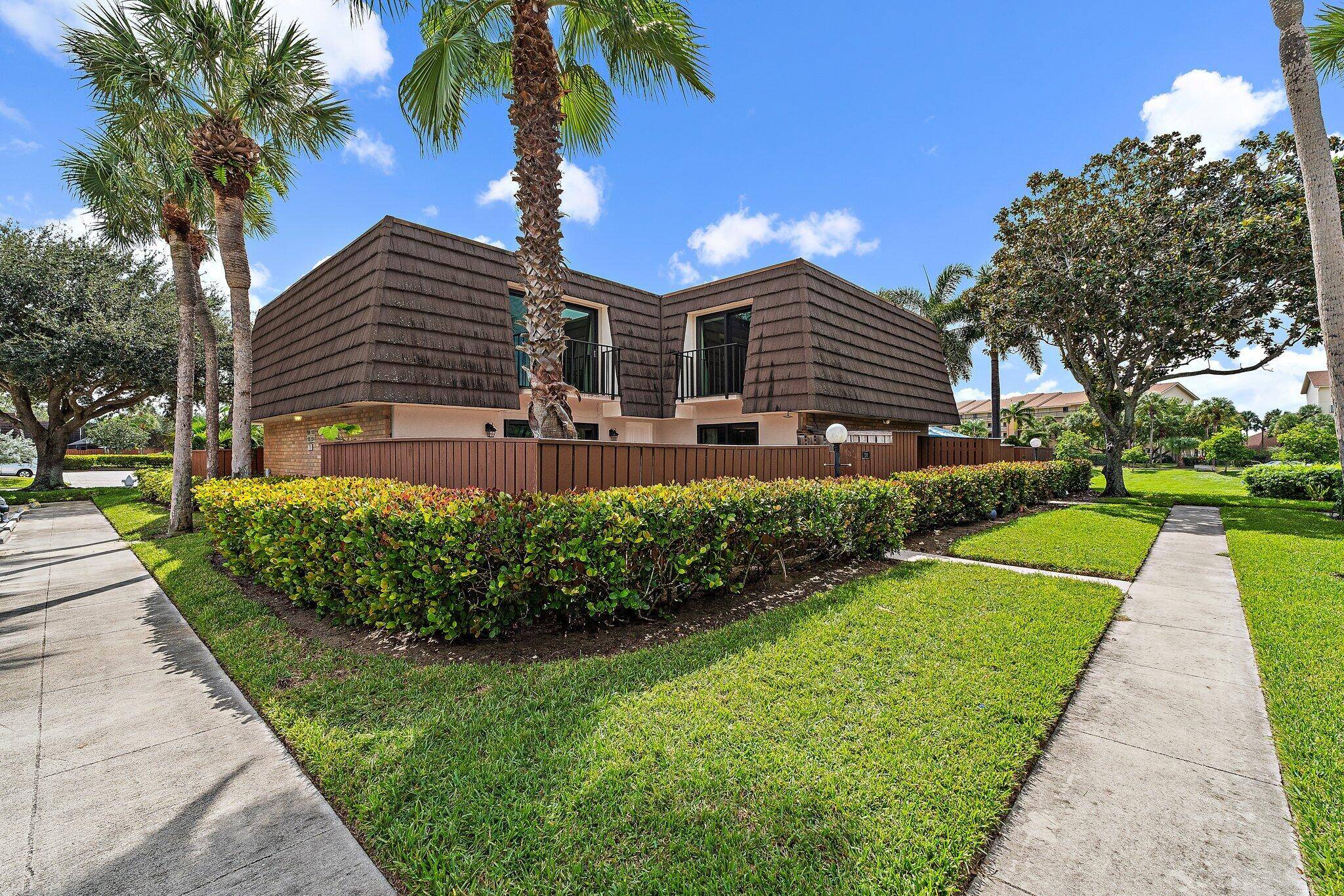 Nicely Renovated Townhouse in The Lakes at the BluffsBeautifully updated townhouse featuring a spacious outdoor patio surrounded by lush landscaping, perfect for entertaining and BBQs.
