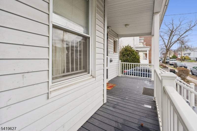 Wonderful 3 family home in a great location, set on a large double lot.