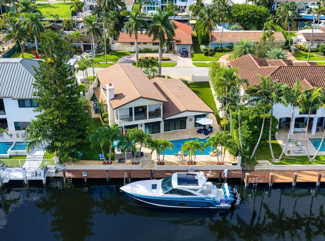 An idyllic lifestyle awaits at this Island Inspired Deepwater Estate sited on 80 of waterfrontage in the sought after enclave of Lighthouse Point.