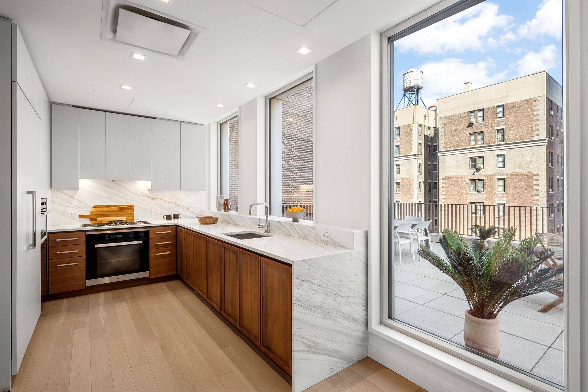 Presenting Residence 7A at 212W93, a 2, 041 square foot three bedroom, two and a half bathroom home with 508 square feet of private outdoor space.