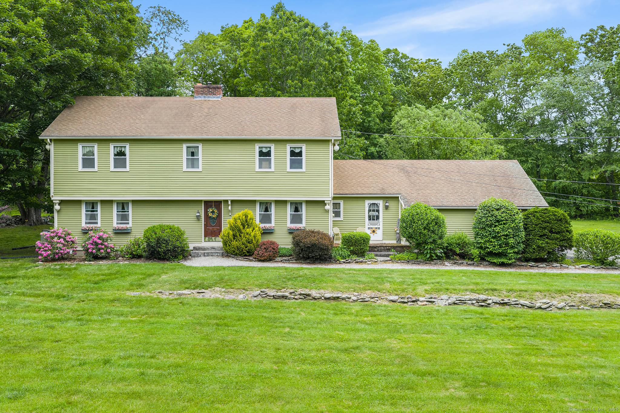 True Country Living on 12 Acres Equestrian Estate, Family Compound, or Investment Opportunity Discover the charm of New England living on this private 12 acre estate ideal for a horse ...