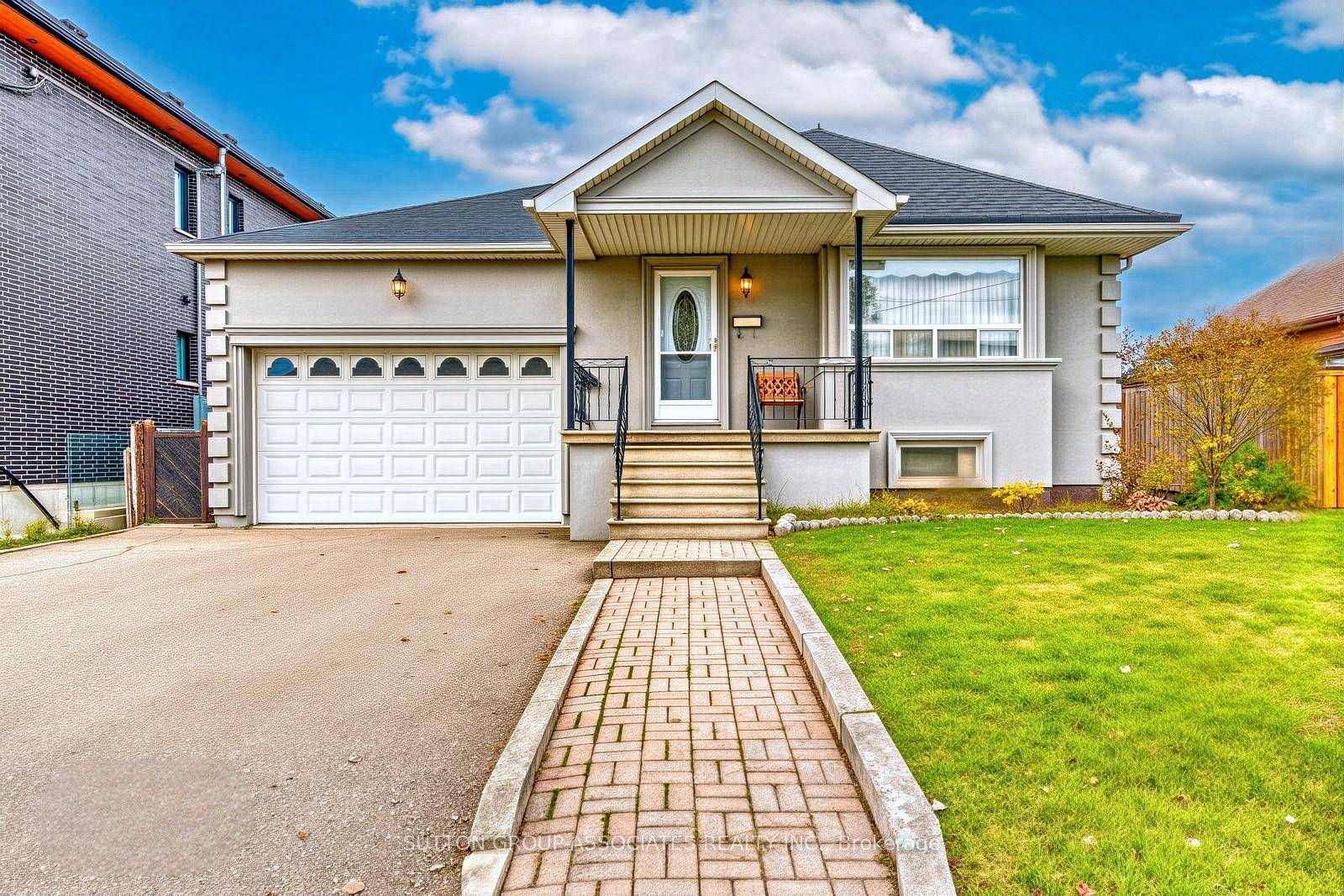 136 Anthony Road Is A Rare, Charming, And Well Preserved Family Sized Bungalow Nestled On An Impressive 52 Foot Wide Lot.