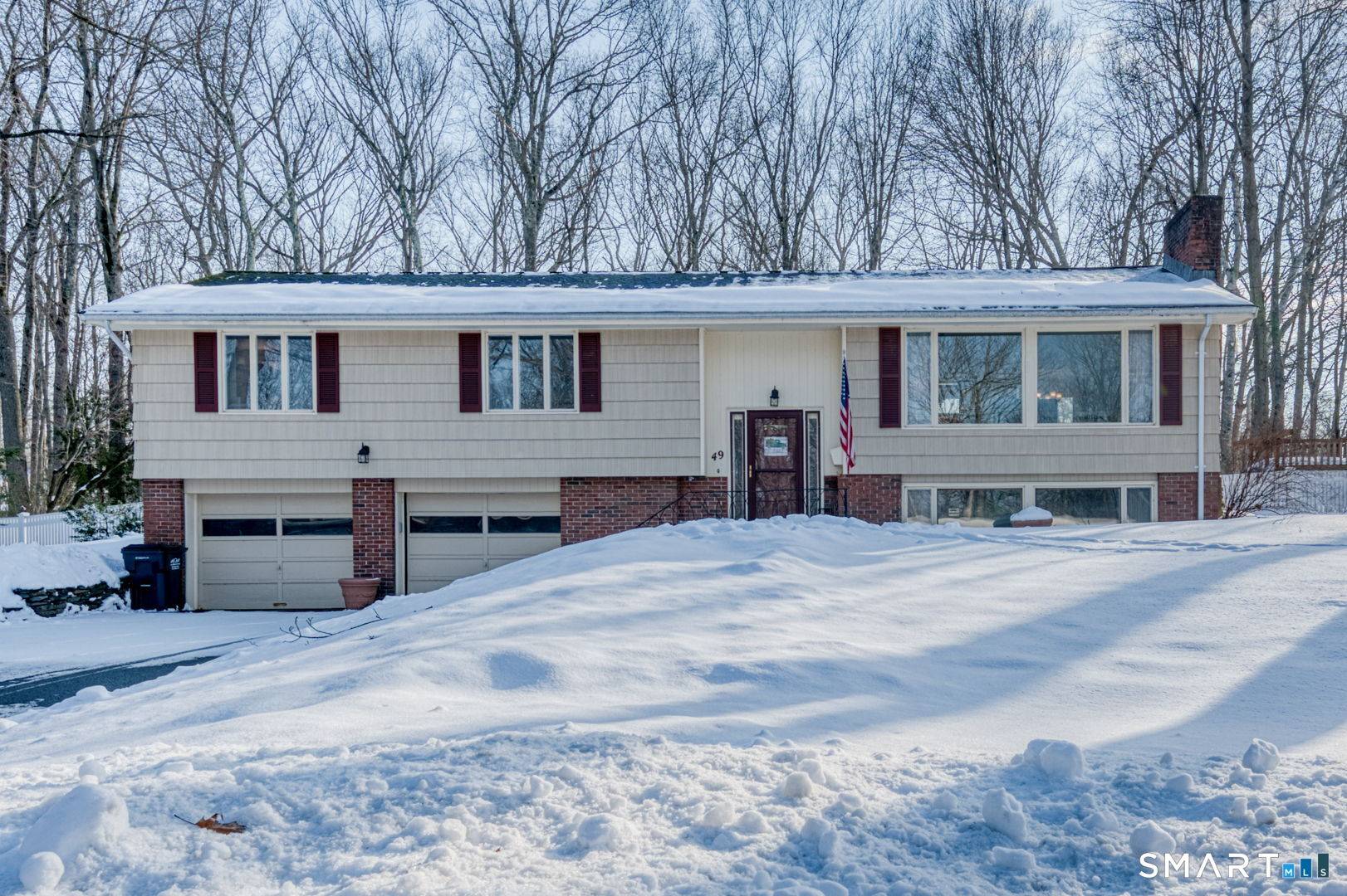 This raised ranch on Deepwood Drive is situated in Birch Hill and offers a well balanced layout with approximately 2, 100 square feet of living space.