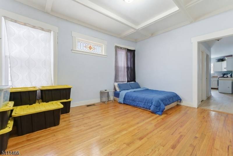 This legal two family home in Upper Clinton Hill features 8 bedrooms and 3 full baths on a quiet Newark street.