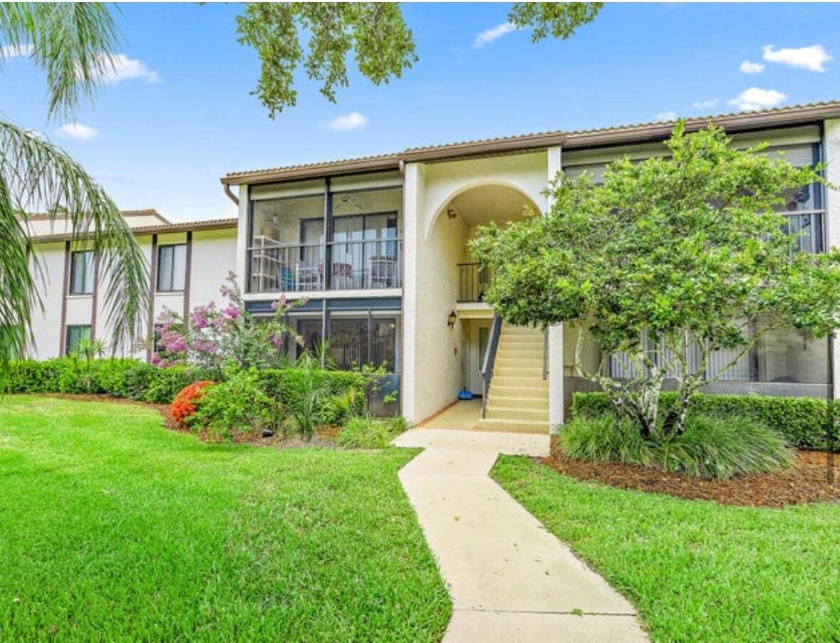 Welcome to this beautiful first floor well maintained 2 bedroom, 2 bathroom condo in the desirable ALL AGES GATED community in Pine Ridge at Martin Downs, offering resort style amenities ...