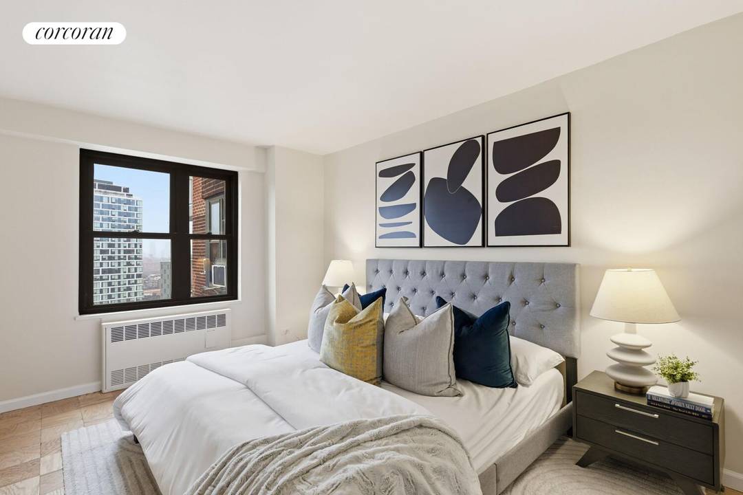 Welcome to Residence K1906 at 387 Grand Street in Seward Park, a sun filled one bedroom home perched on the 19th floor with an exceptionally long, highly coveted terrace.