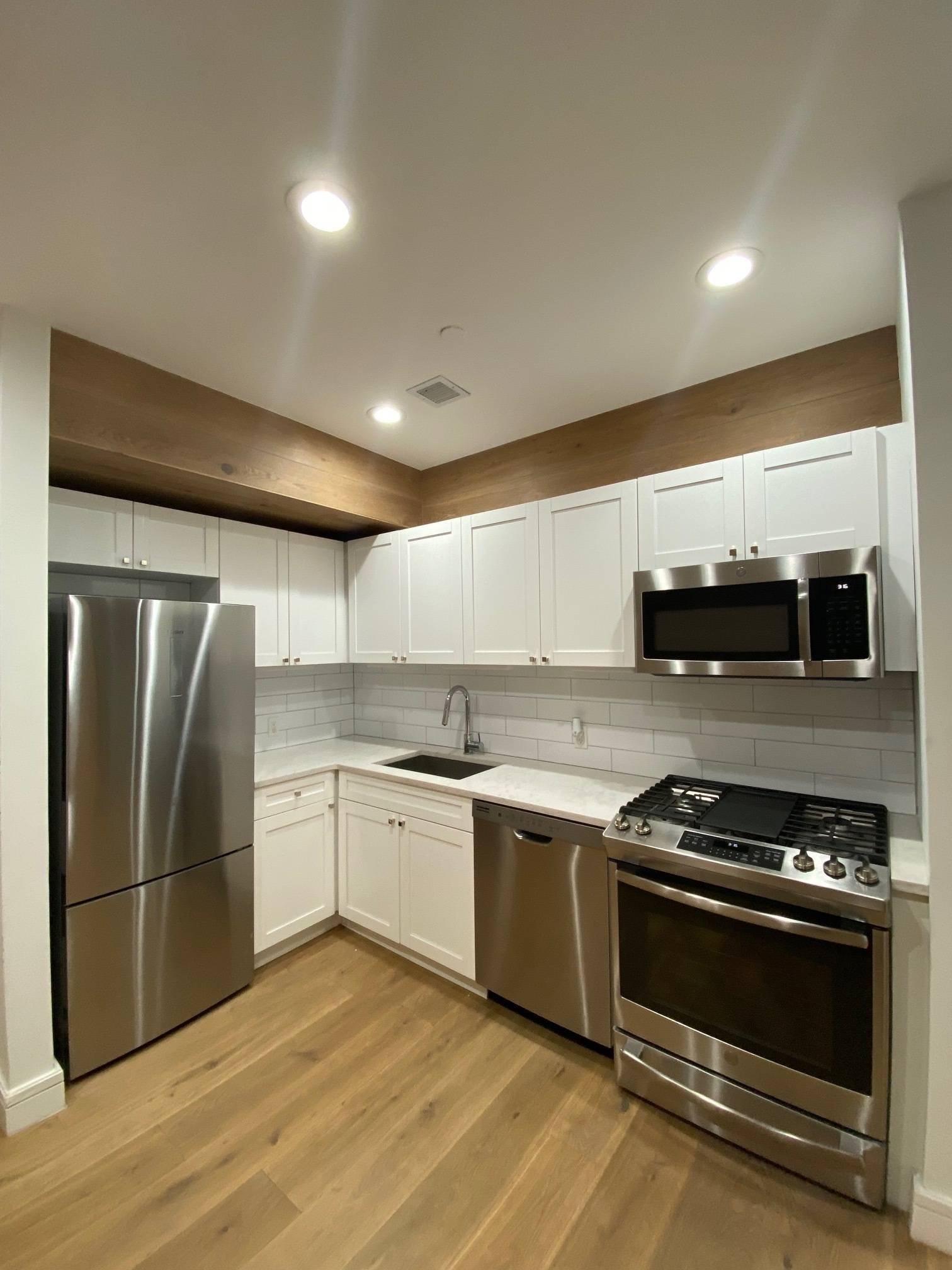 Welcome home. Located on a quiet tree lined street in a boutique rental building in Windsor Terrace, this sunny, duplex 2 bedroom, 2.