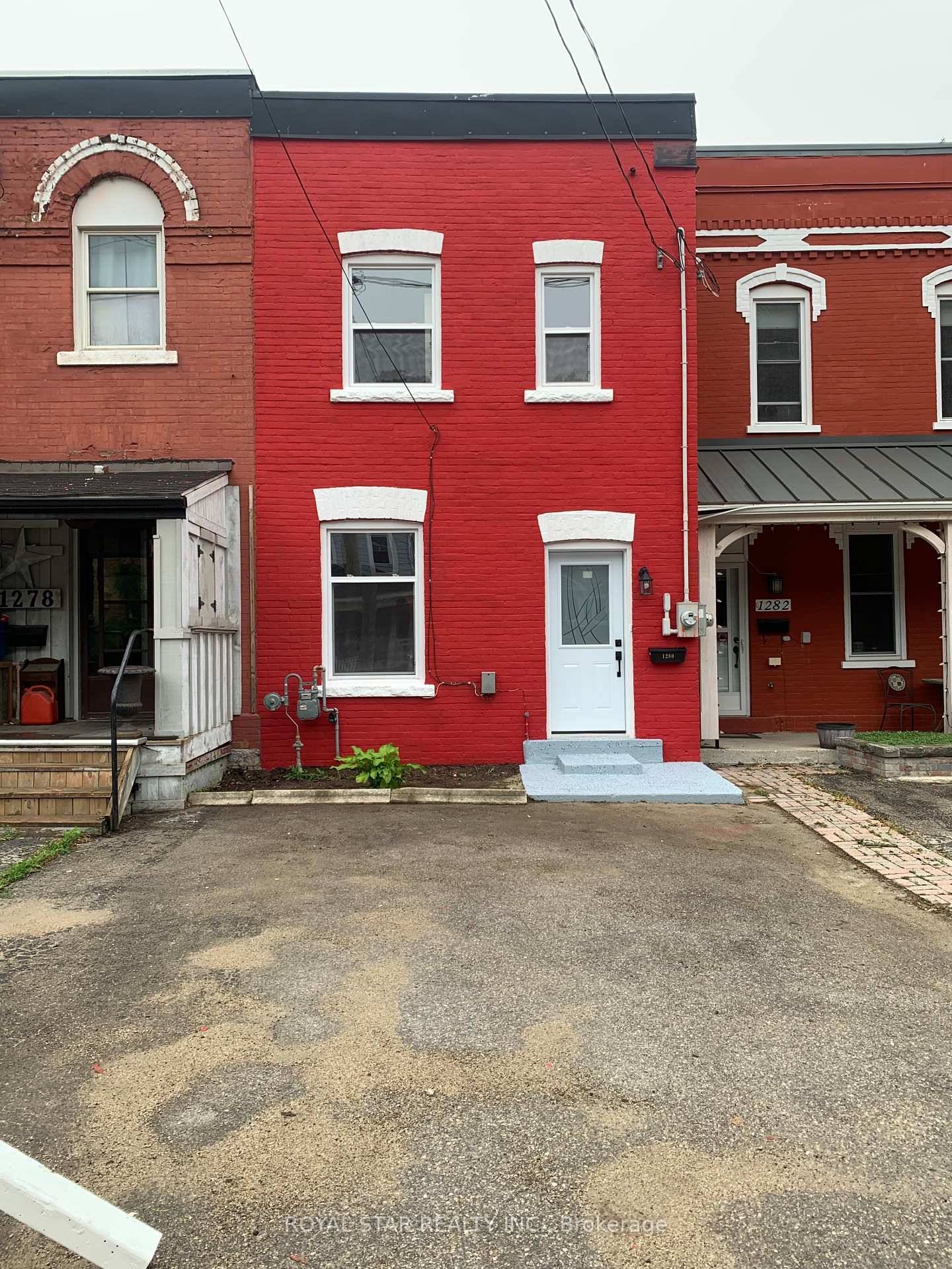 Newly renovated move in ready home with new windows, new kitchen, new main floor, new Samsung fridge, stove, and laundry machines.
