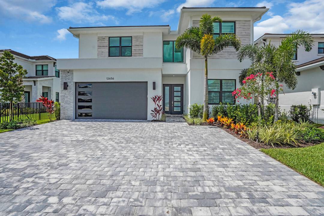 COMPLETED APRIL 2025 ! Why wait to build when you can own this brand new Manhattan model in the exclusive boutique community of Solana Bay at Avenir ?