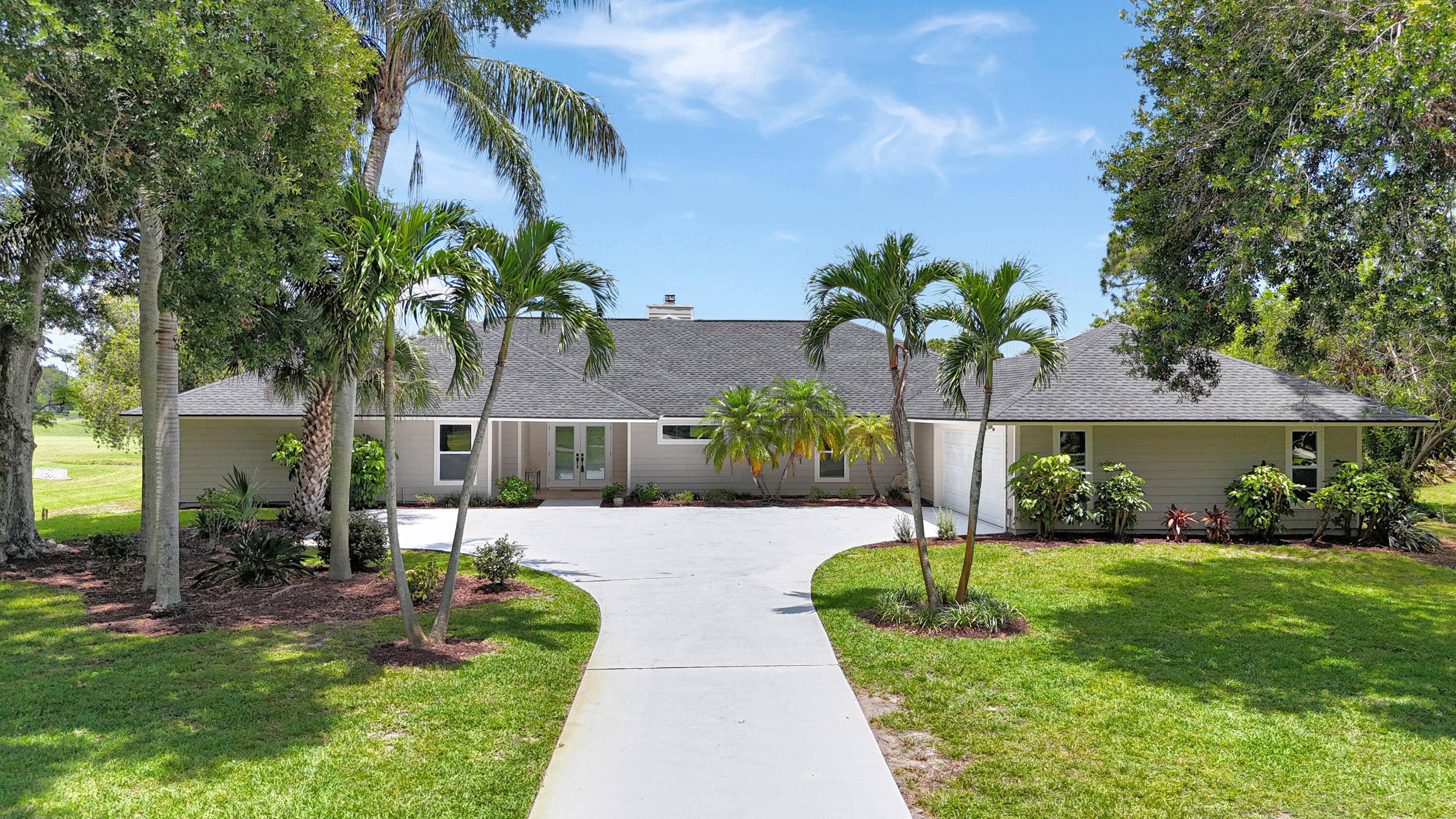 Meticulously maintained 4 bedroom, 3 bath pool home on a full 1 acre lot in the sought after Evergreen Club with sweeping golf course views.