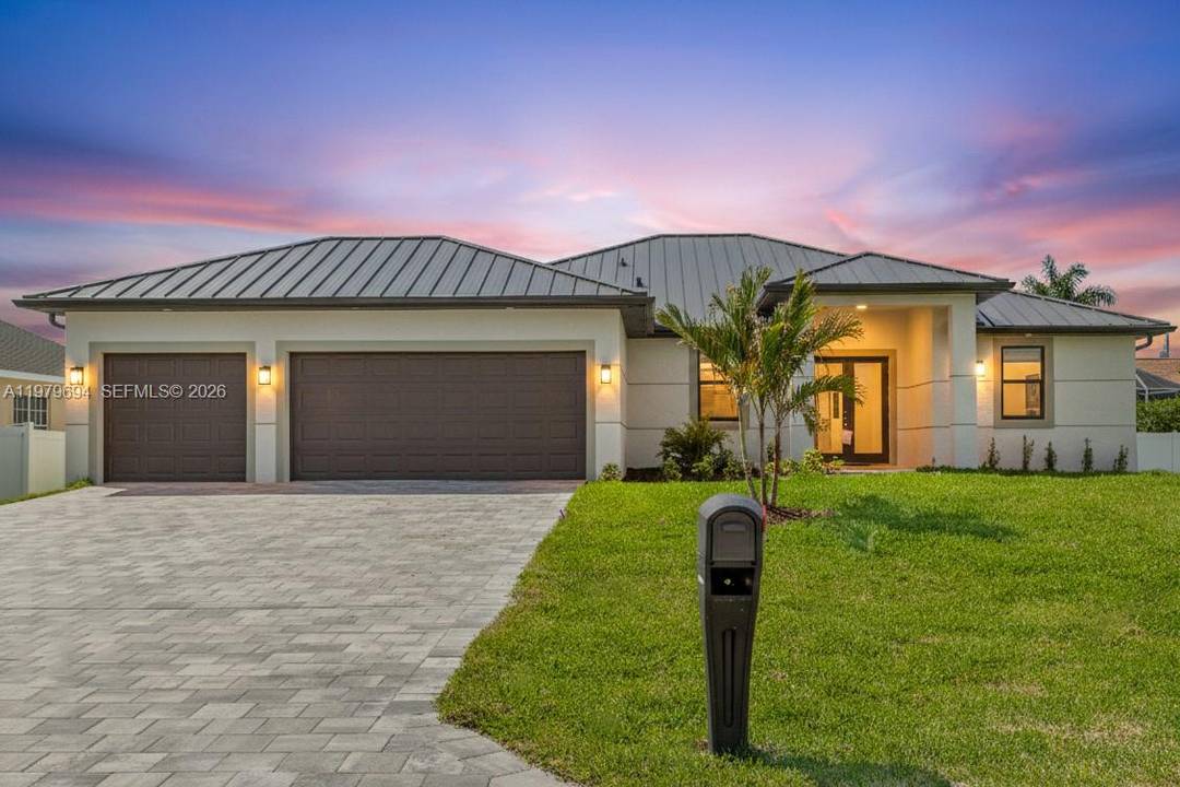 Move in ready 2026 NEW CONSTRUCTION in NW Cape Coral w 2 10 Home Warranty, metal roof, 3 car garage, NO HOA amp ; NO FLOOD INSURANCE REQUIRED !