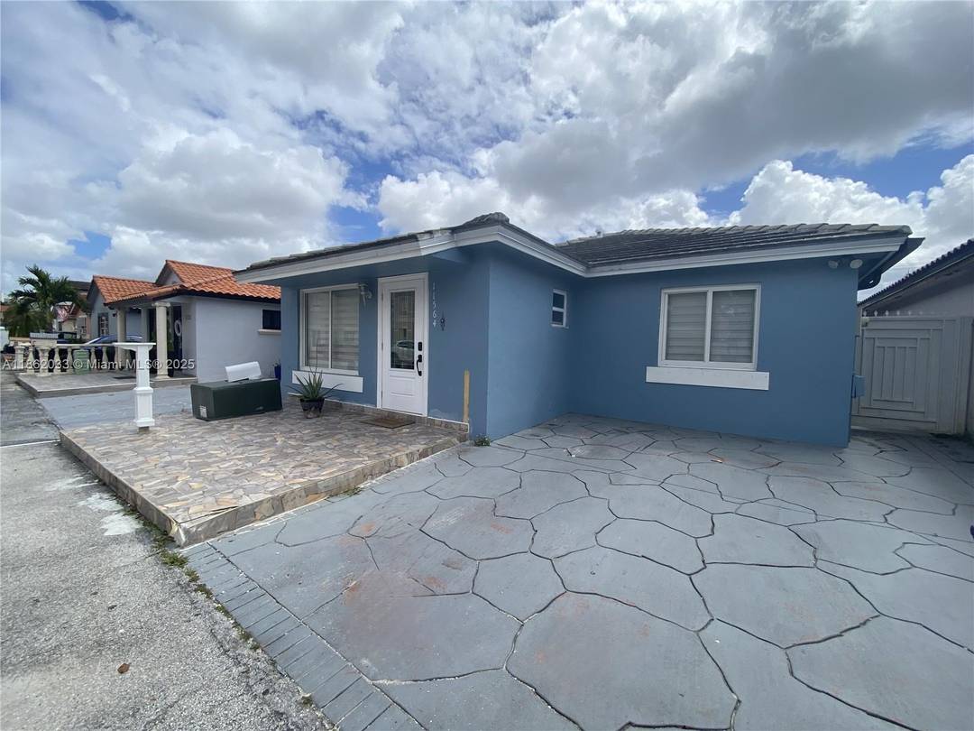 REMODELED HOME featuring IMPACT WINDOWS AND DOORS, 2019 ROOF, 2023 A C, and 2024 LG front load washer and dryer.