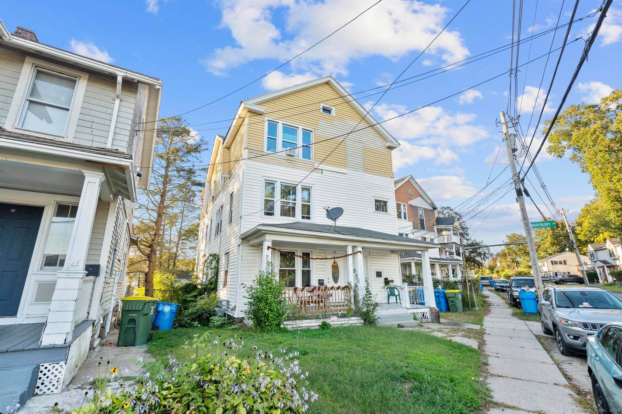 Owner occupy or invest in this spacious 3 family in Waterbury's desirable East End, offering immediate cash flow.