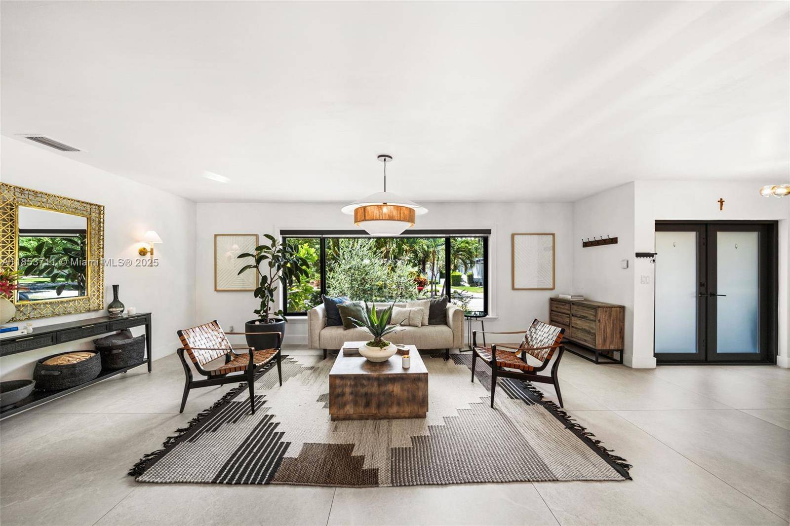 Introducing MAISON CHARME, an impeccably renovated 4 bed, 3 bath home in exclusive Bay Heights.
