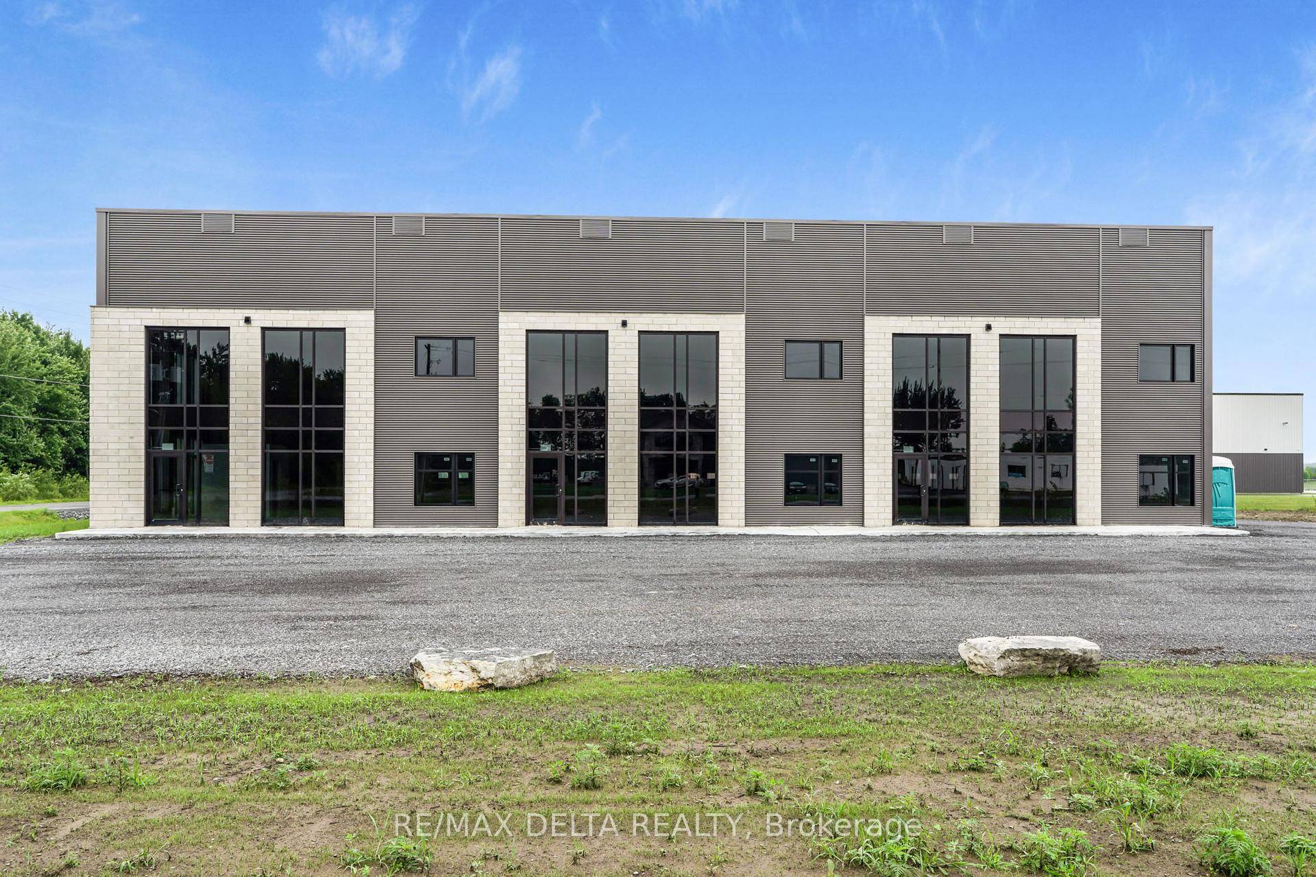 This exceptional commercial building located in Innovation Park, featuring 3 large rear garage door for effortless loading and unloading.