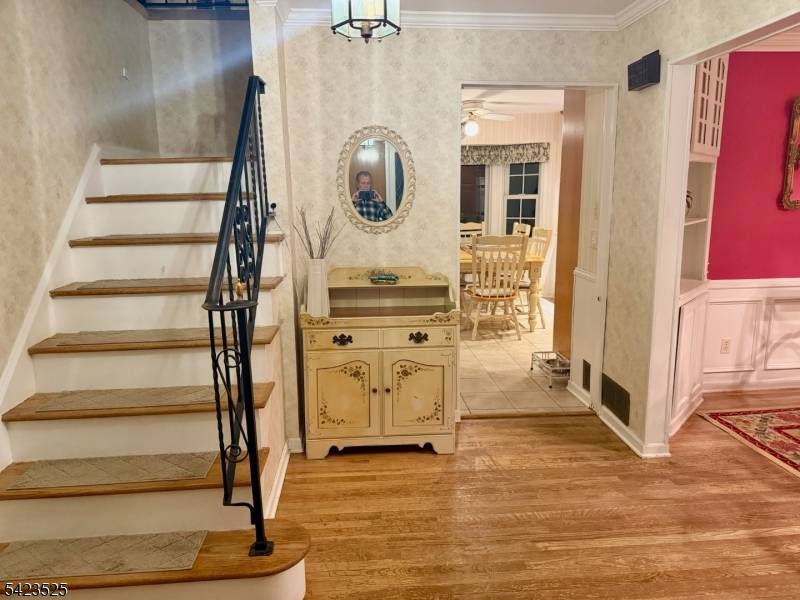 Nestled on a cul de sac in Randolph's most desirable lake community, with views of the lake from the front porch, this classic Colonial blends timeless architecture with French country ...
