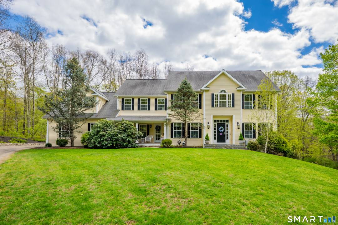 Beautiful Colonial set on a private 3 acre lot in sought after Curtiss Meadows, ideally located on the southern end of Woodbury abutting the Southbury line.