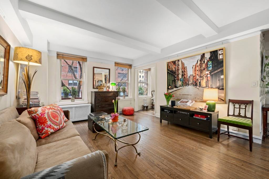 A Warm amp ; Versatile Pre War Gem This inviting 2 bedroom, 2 bath residence stands out with its generously sized, windowed bonus room offering the flexible space every New ...