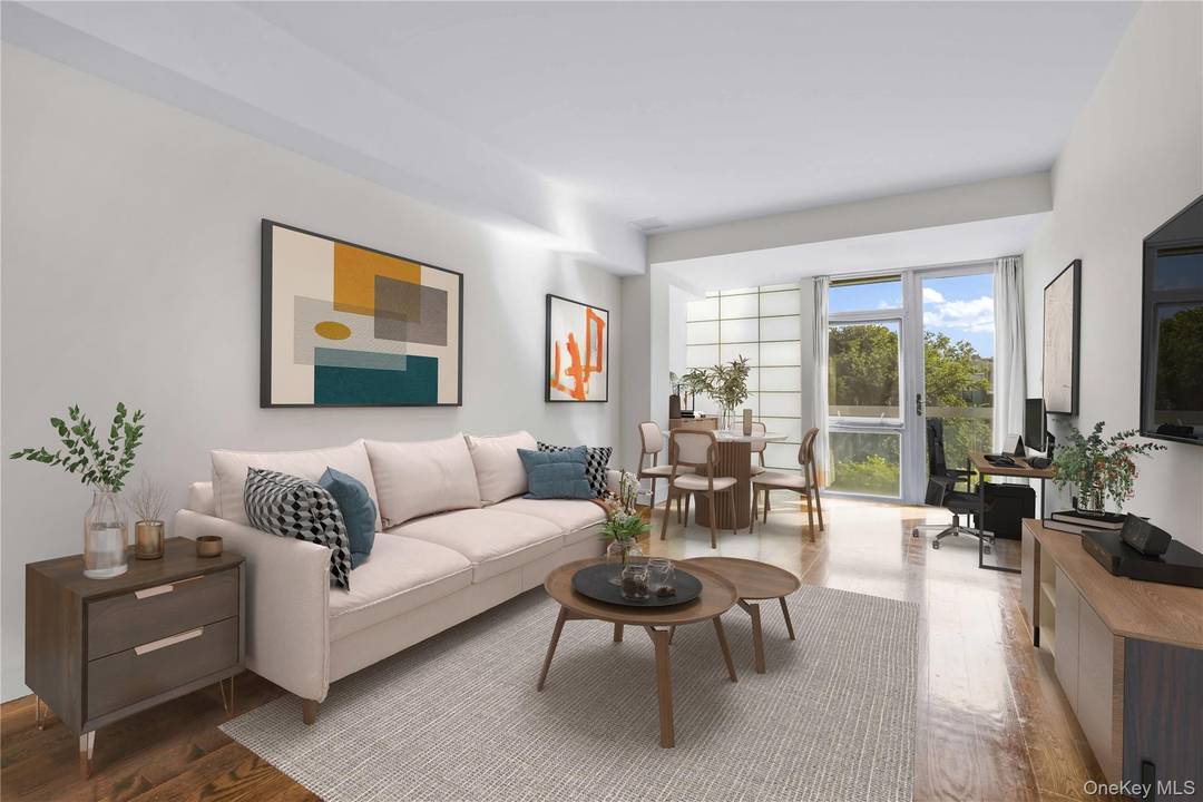 Apartment 3E is a bright and spacious condo accompanied by a private terrace with floor to ceiling windows, bathing the space in natural light with a portal view of Manhattan.