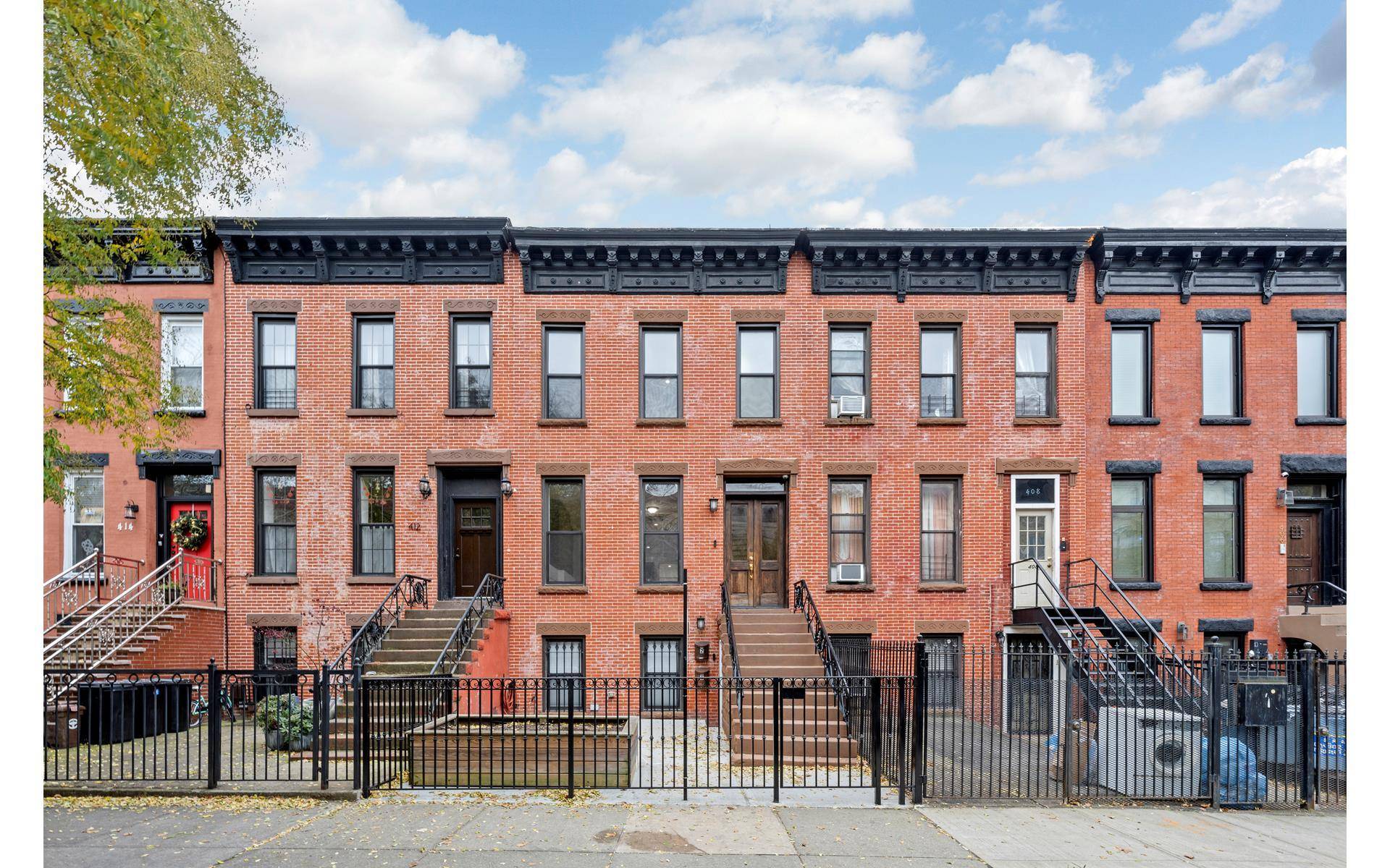 Welcome to 410 Chauncey 2, a beautifully updated residence in a classic Federal Style Brick townhouse, built 19 45 with an extension on the garden level, and situated on a ...