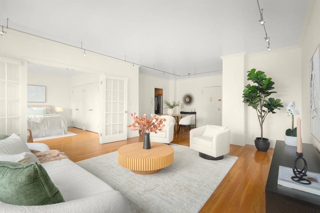 Stunning and spacious 2 bedroom 2 bath home on the Penthouse level of the Devon Condominium.