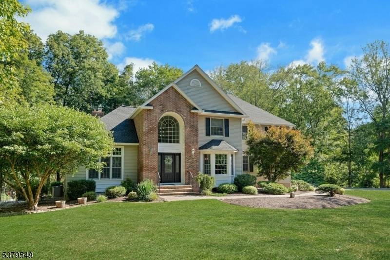Impeccably maintained and beautifully updated, this 4 bedroom, 3.