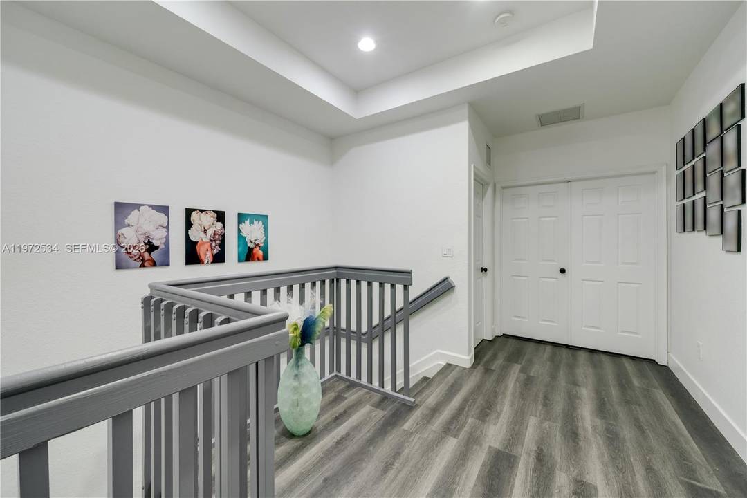 Townhouse 3BD 2. 5B in gated Homestead community of Keys Garden, it has high ceilings, patio, attached garage, walk in closets, storage under stairs, and A C.