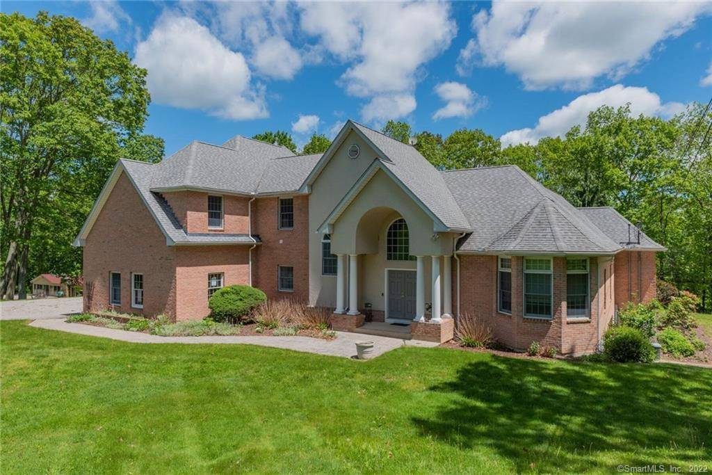 Stunning brick contemporary home with seasonal views of Colchester.