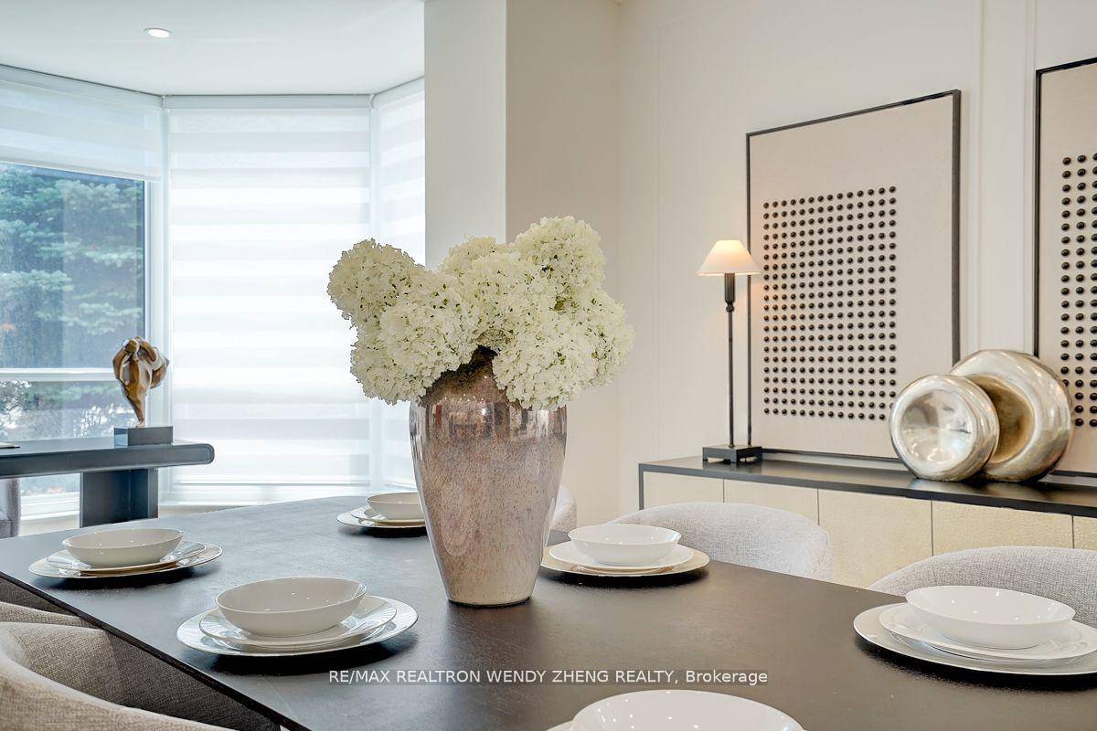 Welcome to a rare gem in the heart of North York a radiant southwest facing corner suite in the highly sought after Atrium II, where timeless design meets luxurious comfort.