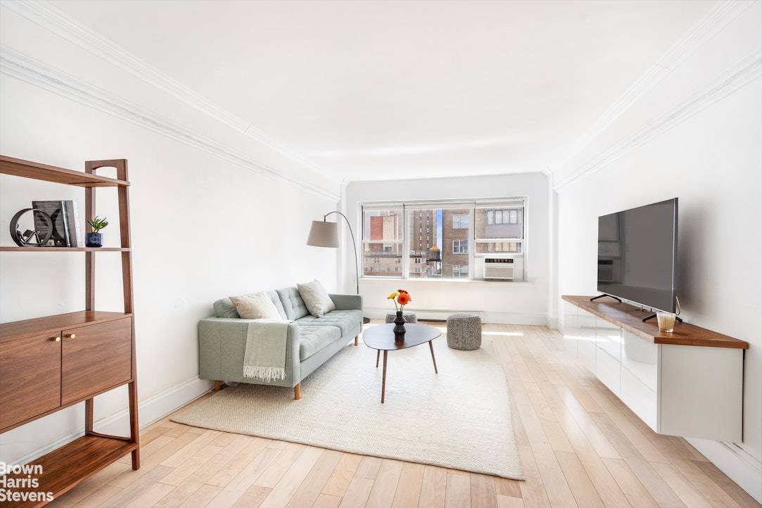 Welcome to apartment 11E, a beautifully renovated high floor corner convertible two bedroom, with in unit washer dryer and custom walk in closet all in the heart of Murray Hill ...