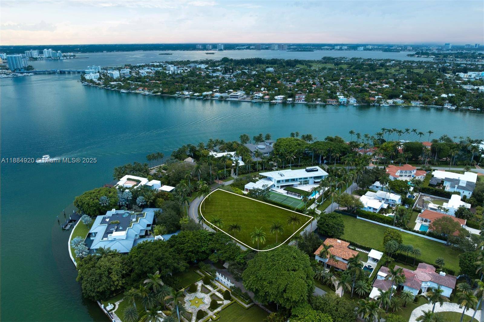 Set within the prestigious enclave of La Gorce Island, this cleared 0.