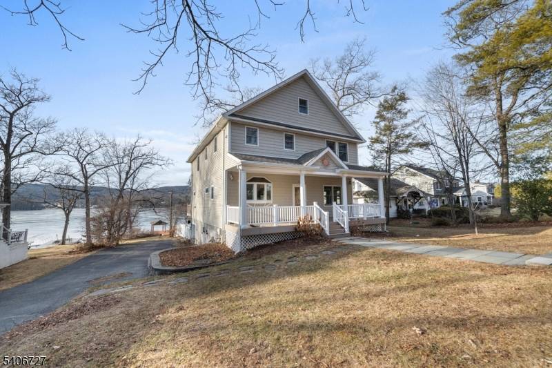 Are you looking for a 4 bedroom 4 full bath lakefront home on the eastern shores of Greenwood Lake in a private lake community with public utilities, private beach, clubhouse, ...
