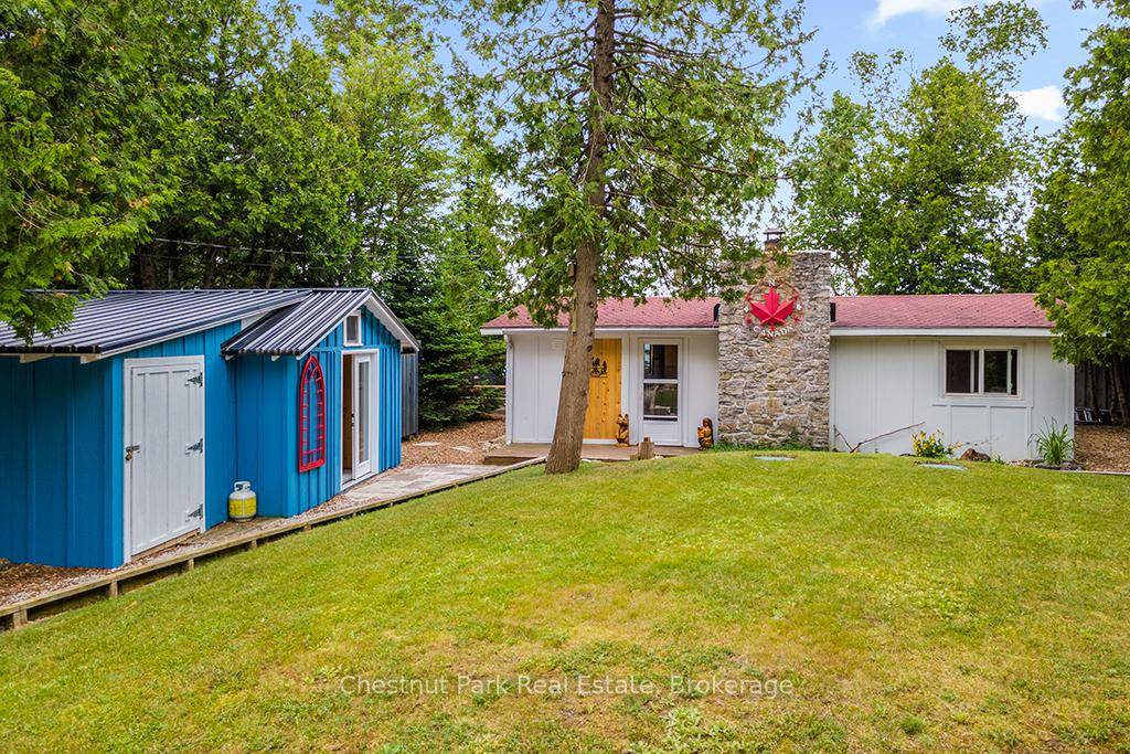This pristine waterfront cottage is located on the highly desirable Hopkins Bay.