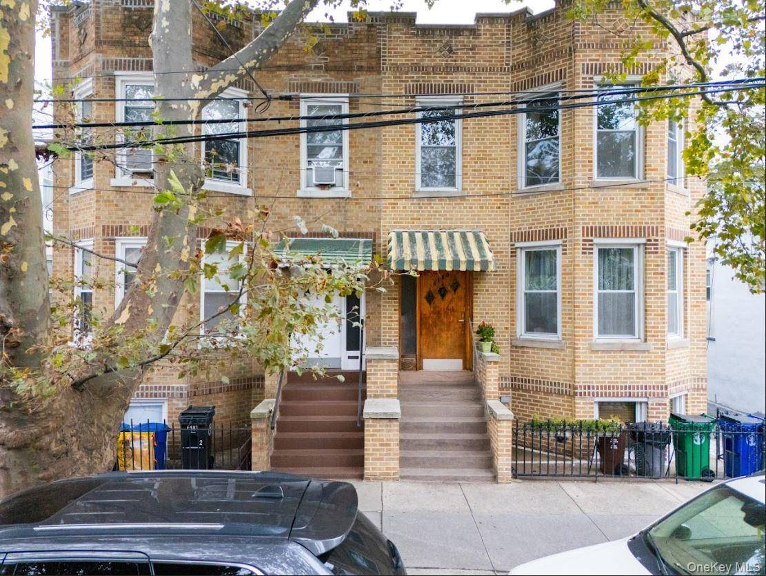 Beautifully maintained Semi Detached Brick 3 Family with Detached 2 Car Garage.