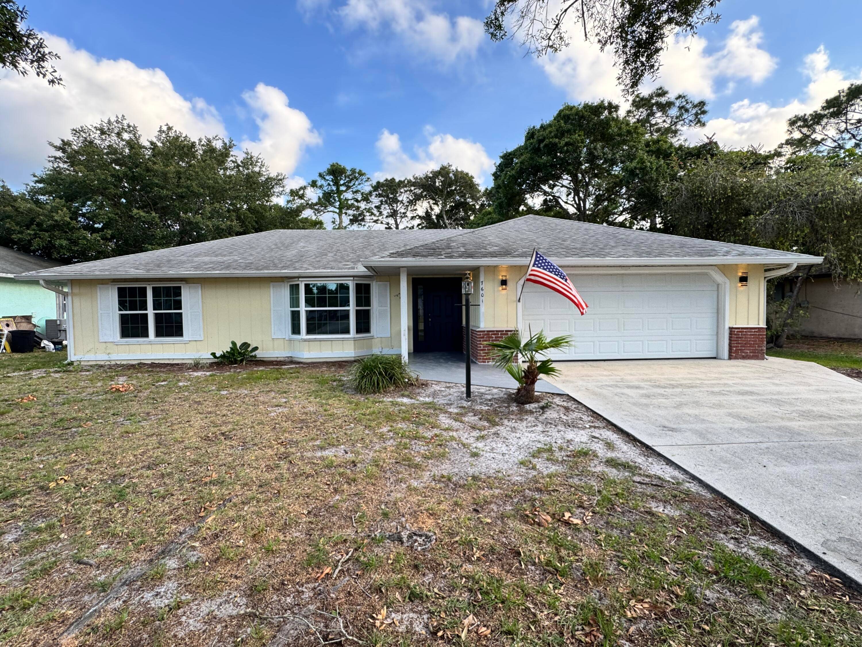 MOVE YOUR FAMILY INTO THIS RECENTLY RENOVATED 3 BEDROOMS, 2 BATHROOMS, 2 CAR GARAGE HOME THAT SITS ON 0.