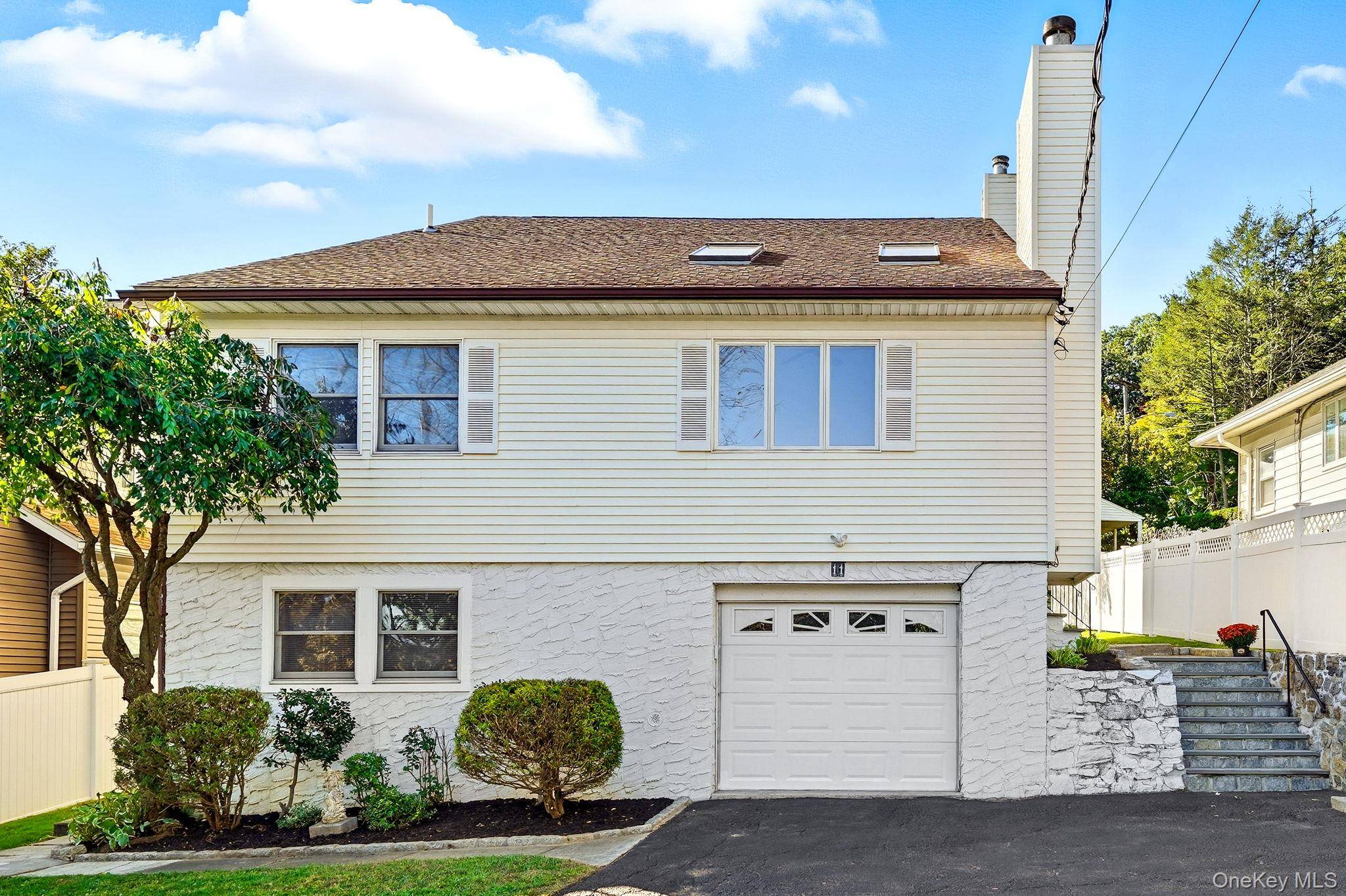 5 bedroom 4 bathroom colonial in the heart of North White Plains.