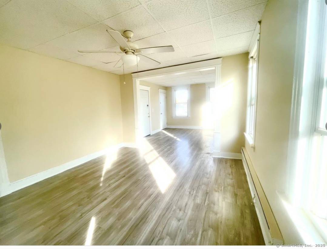 Come see this 3 family house, with a 2 car garage.