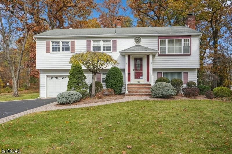 Welcome to 100 Grand Avenue, a beautifully maintained four bedroom, one and two half bath bi level home perfectly situated on a spacious corner lot in sought after Hanover Township.