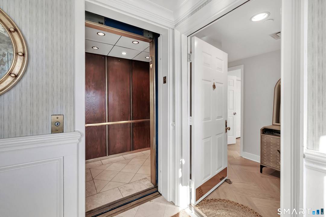 Luxurious fully furnished penthouse with jaw dropping water city views day and night in Stamford's premier waterfront community, Shippan Point.