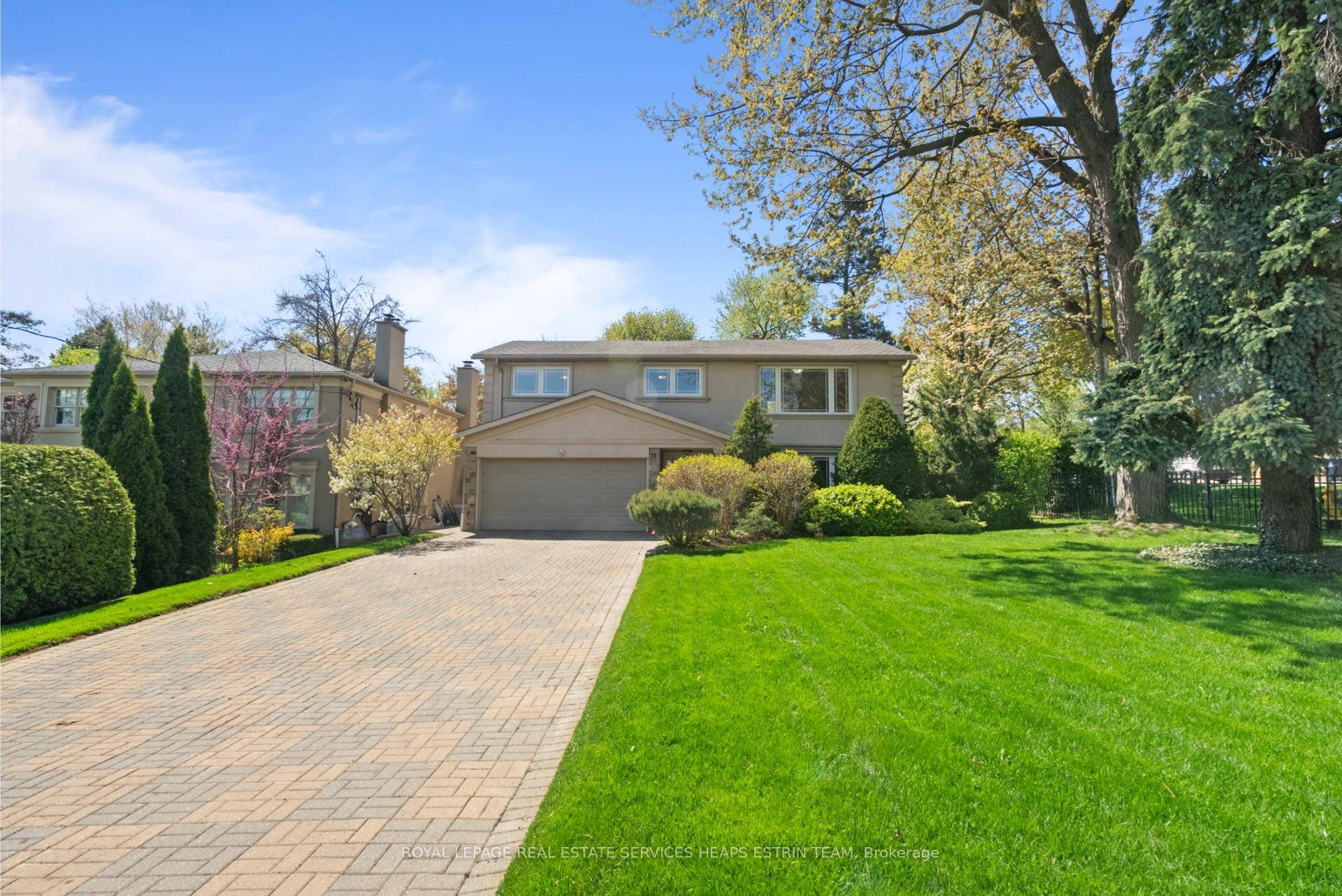 Welcome to 73 Owen Boulevard, a lovingly maintained, detached split level home set on an exceptional 60 x 179 ft corner lot with a private four car drive in the ...