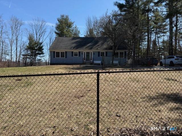 Charming Cape Cod set on a beautiful wooded lot with a fenced in yard and above ground pool, perfect for relaxing and entertaining !