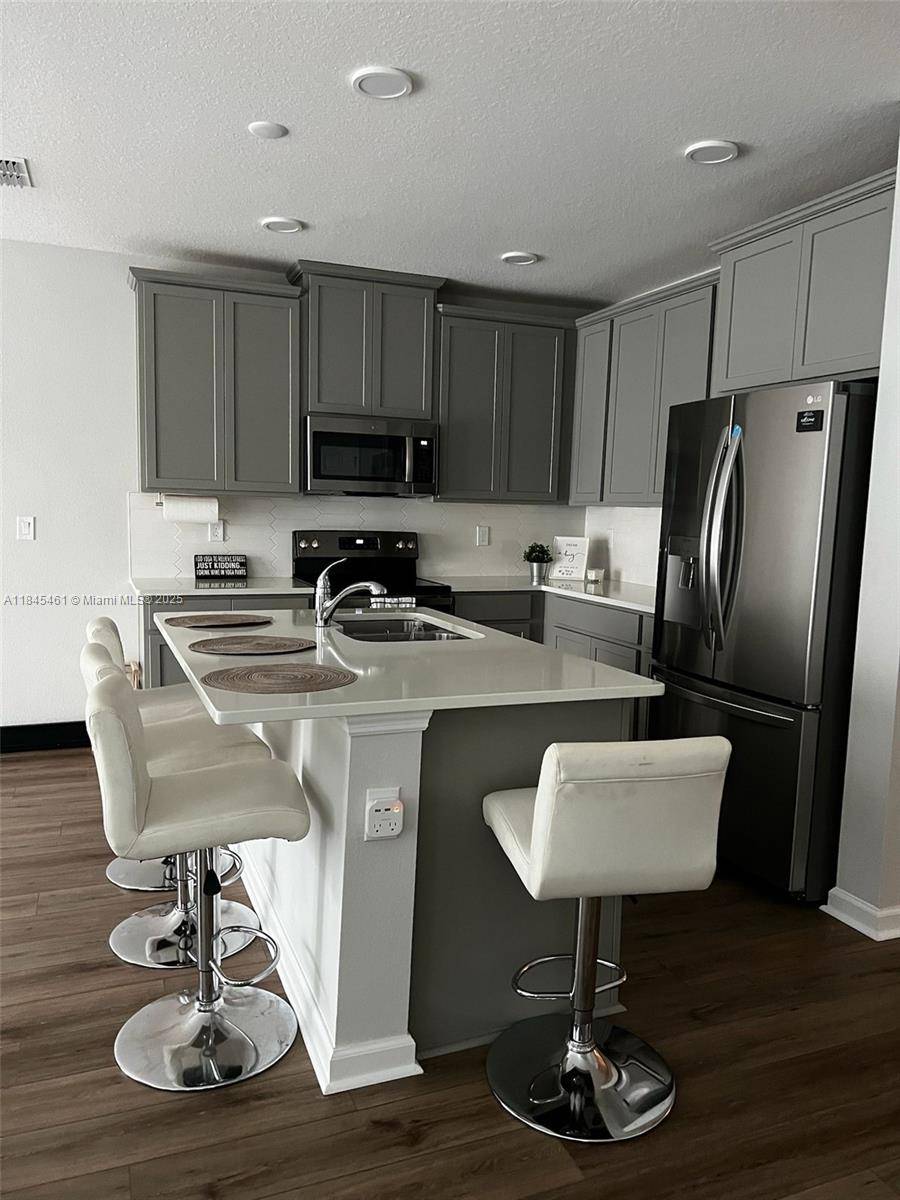 Spacious and beautifully maintained 4 bedroom, 3 bathroom corner unit located in hightly sought after Lake Nona area.